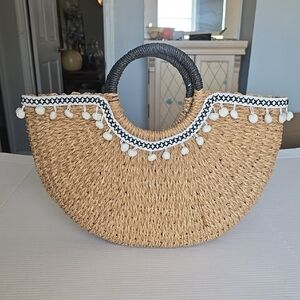 Chic Tan Straw Tote Bag with Black Accents